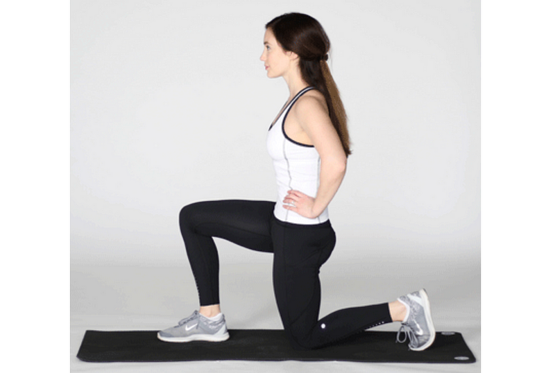 Demonstration of posterior pelvic tilt exercise