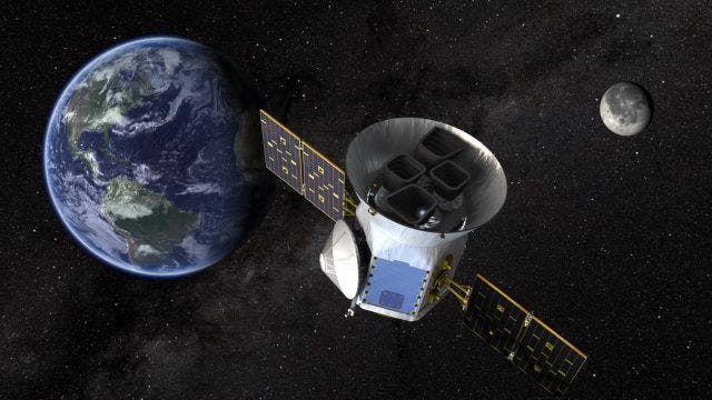 TESS satellite in space capturing exoplanet data